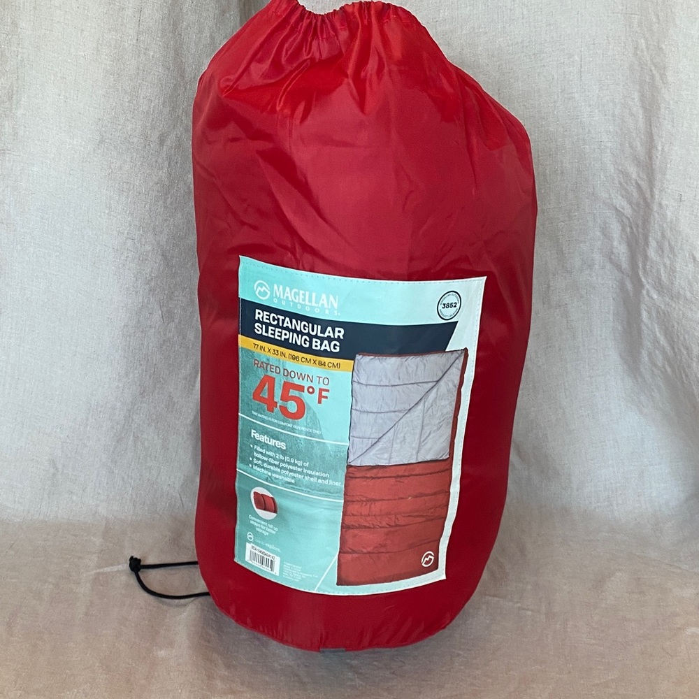 Magellan Outdoors Red Rectangular Sleeping Bag in Storage Sack